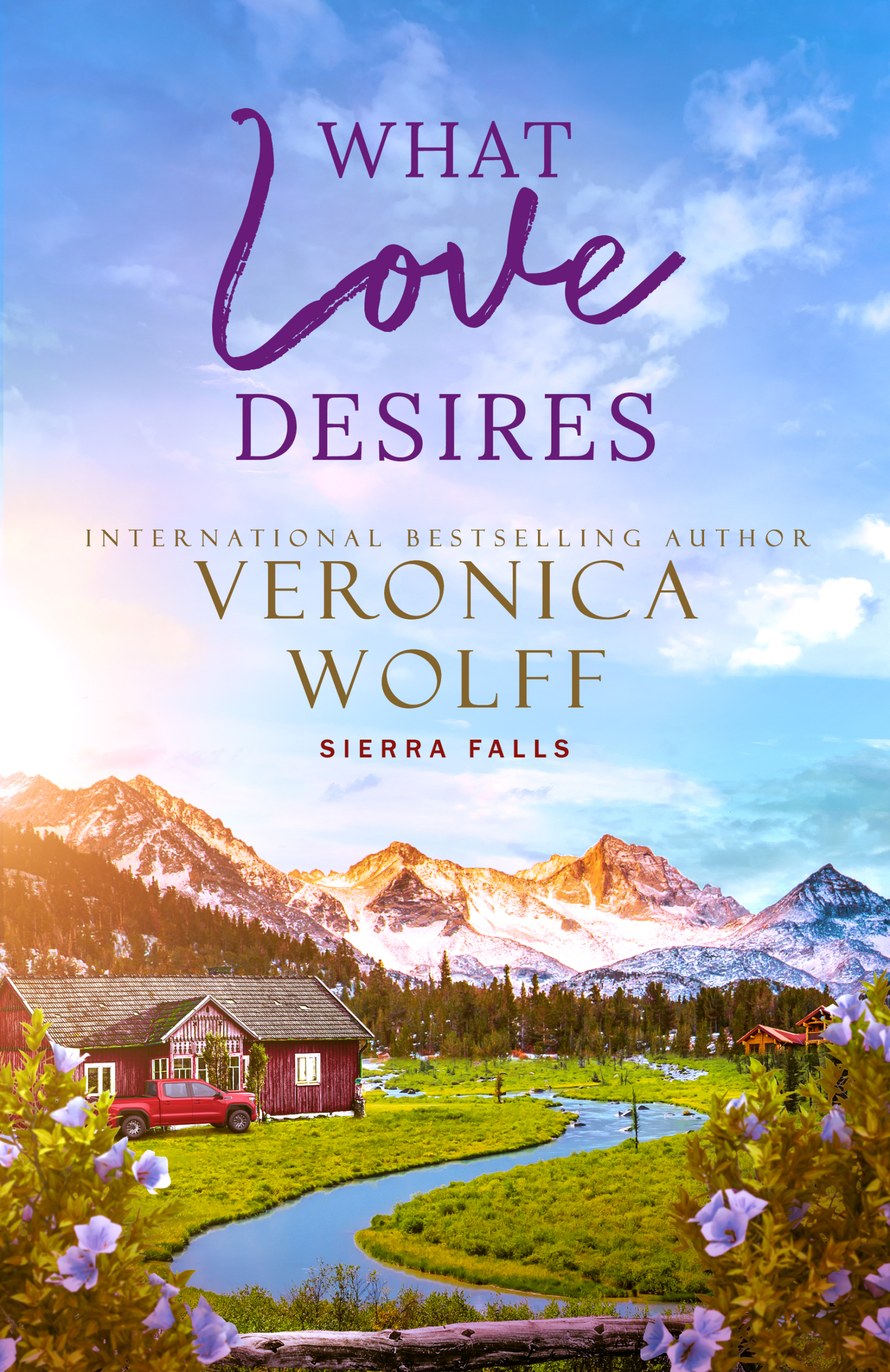 Book cover for What Love Desires by Veronica Wolff, Sierra Falls series, showing a red farmhouse and red pickup truck beside a winding creek below snowcapped mountains, framed by purple flowers.