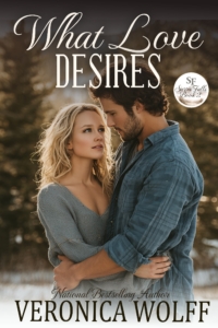 Book cover for What Love Desires by Veronica Wolff, showing a couple standing close together in a small town, outdoor setting.